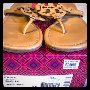 Tory Burch Miller flip flops.- patent Sand